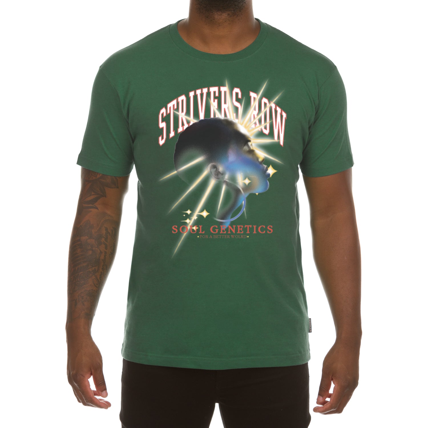 A man wearing a green Aura Tee with the words strife's way on it.